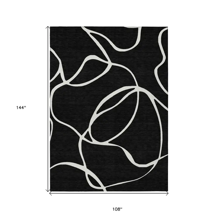 9' X 12' Black And Ivory Abstract Washable Indoor Outdoor Area Rug