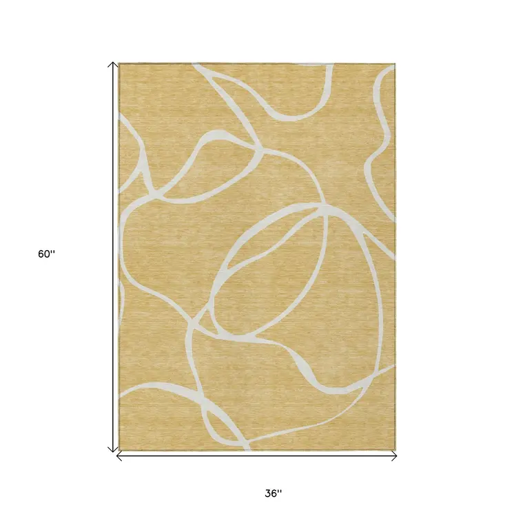 3' X 5' Gold And Ivory Abstract Washable Indoor Outdoor Area Rug