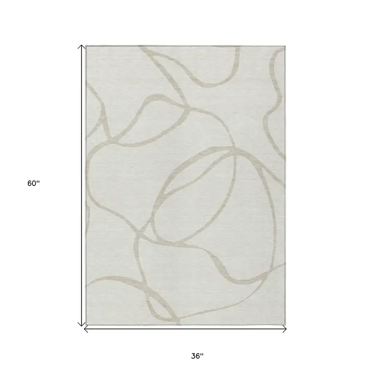 3' X 5' Ivory And Beige Abstract Washable Indoor Outdoor Area Rug