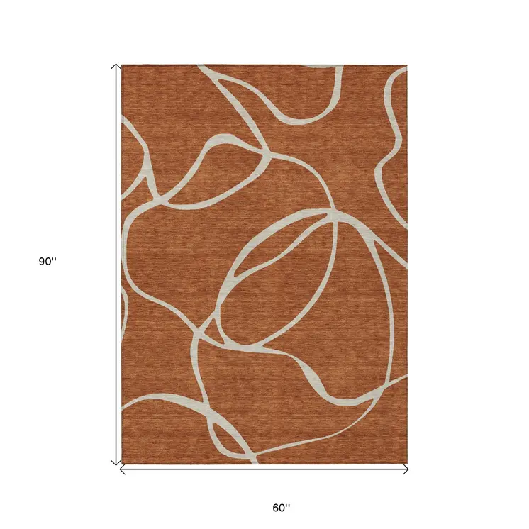 5' X 8' Copper And Ivory Abstract Washable Indoor Outdoor Area Rug