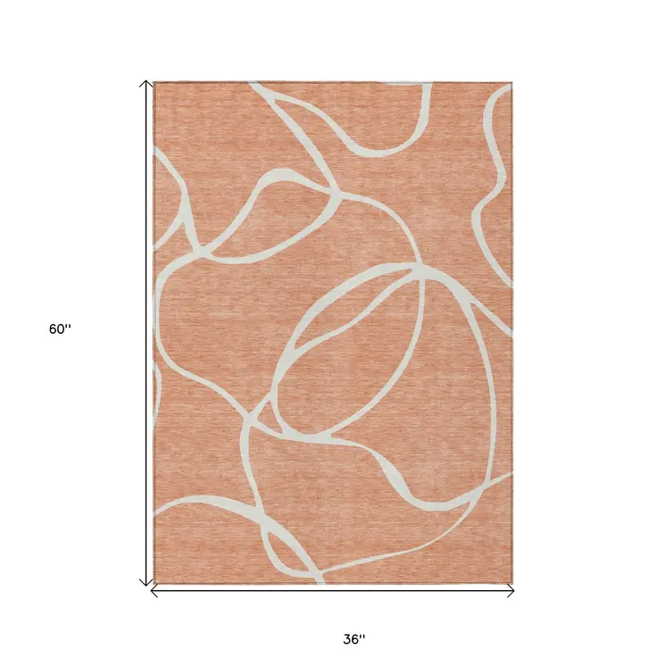 3' X 5' Salmon And Ivory Abstract Washable Indoor Outdoor Area Rug