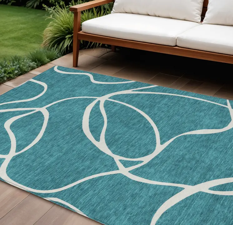 8' X 10' Teal Blue And Ivory Abstract Washable Indoor Outdoor Area Rug