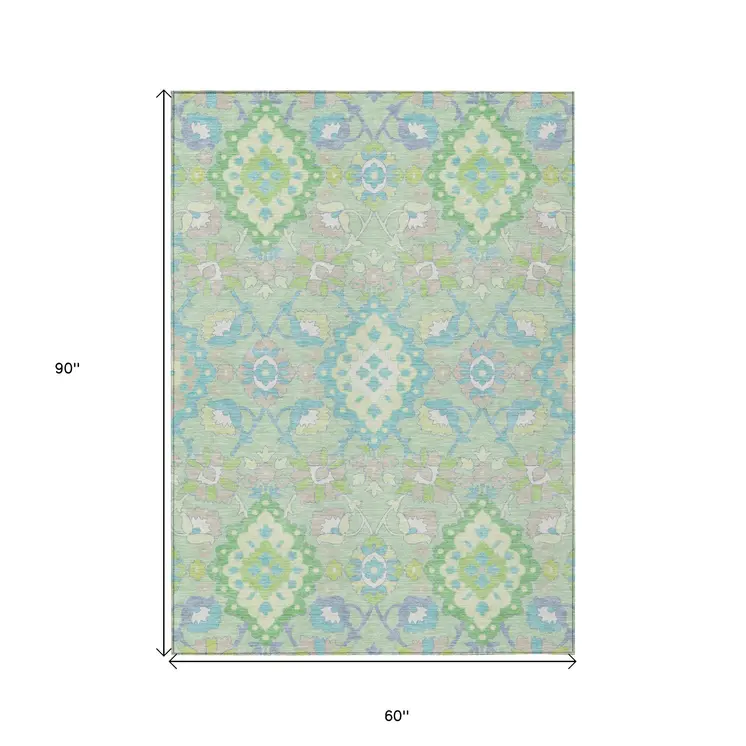 5' X 8' Mint Green Blue And Ivory Oriental Washable Indoor Outdoor Area Rug