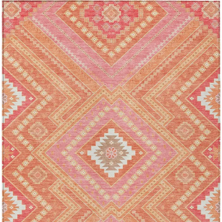 5' X 8' Coral Pink And Ivory Tribal Washable Indoor Outdoor Area Rug