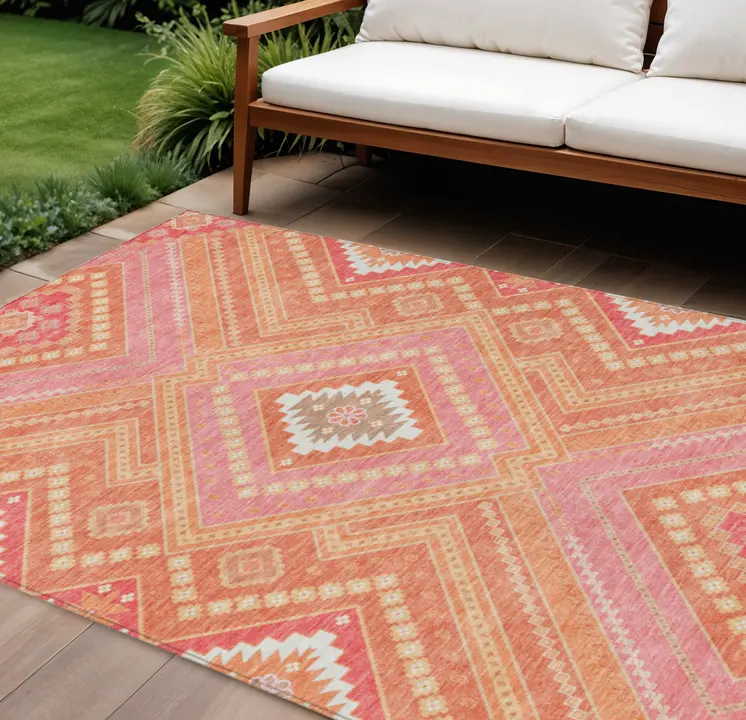 9' X 12' Coral Pink And Ivory Tribal Washable Indoor Outdoor Area Rug