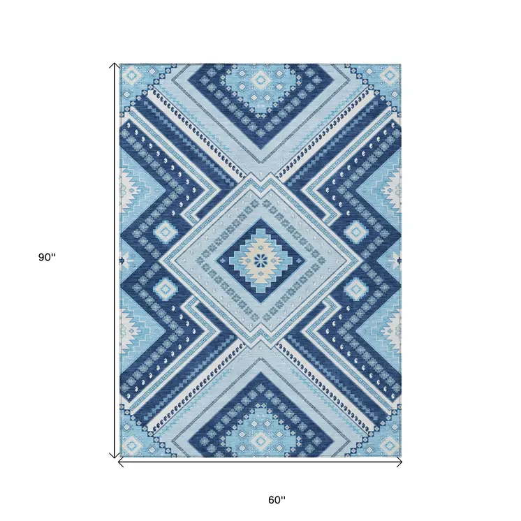 5' X 8' Navy Blue Aqua And Ivory Tribal Washable Indoor Outdoor Area Rug