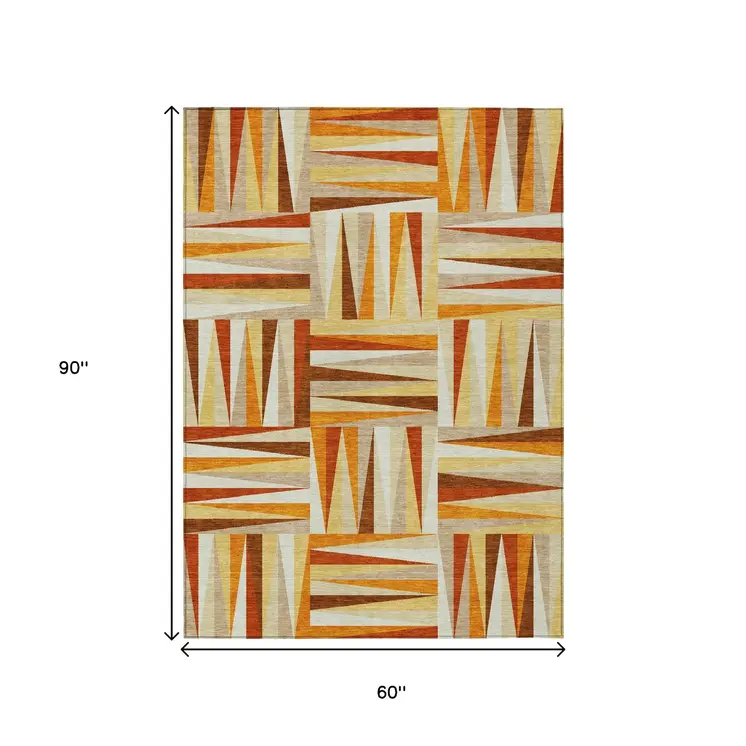 5' X 8' Orange Geometric Washable Indoor Outdoor Area Rug