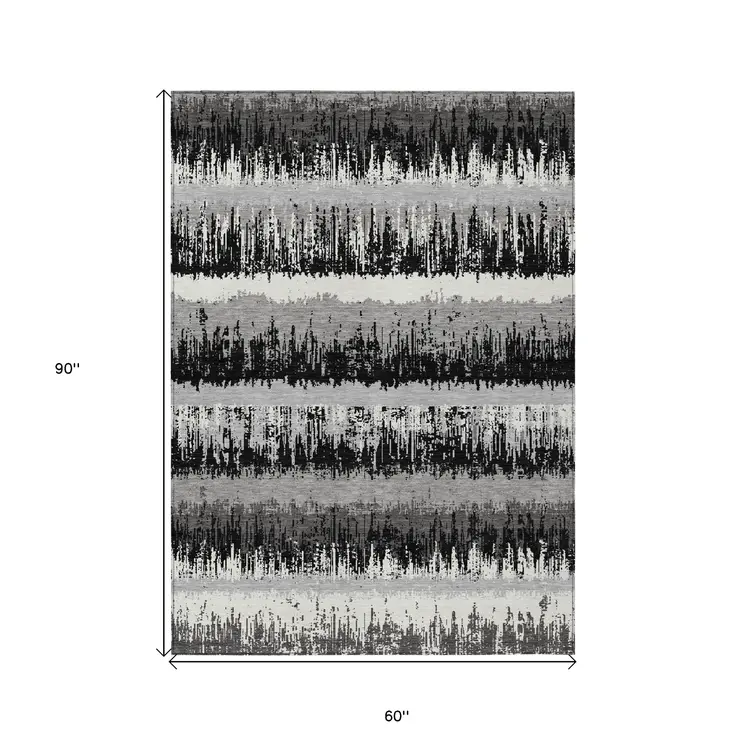5' X 8' Black Gray And Ivory Striped Washable Indoor Outdoor Area Rug