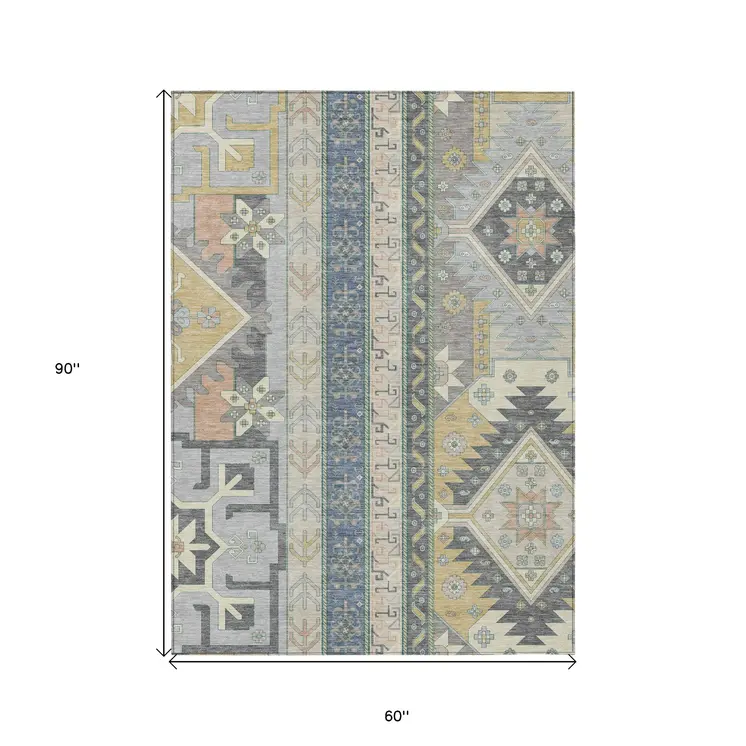5' X 8' Silver Beige And Gold Aztec Washable Indoor Outdoor Area Rug