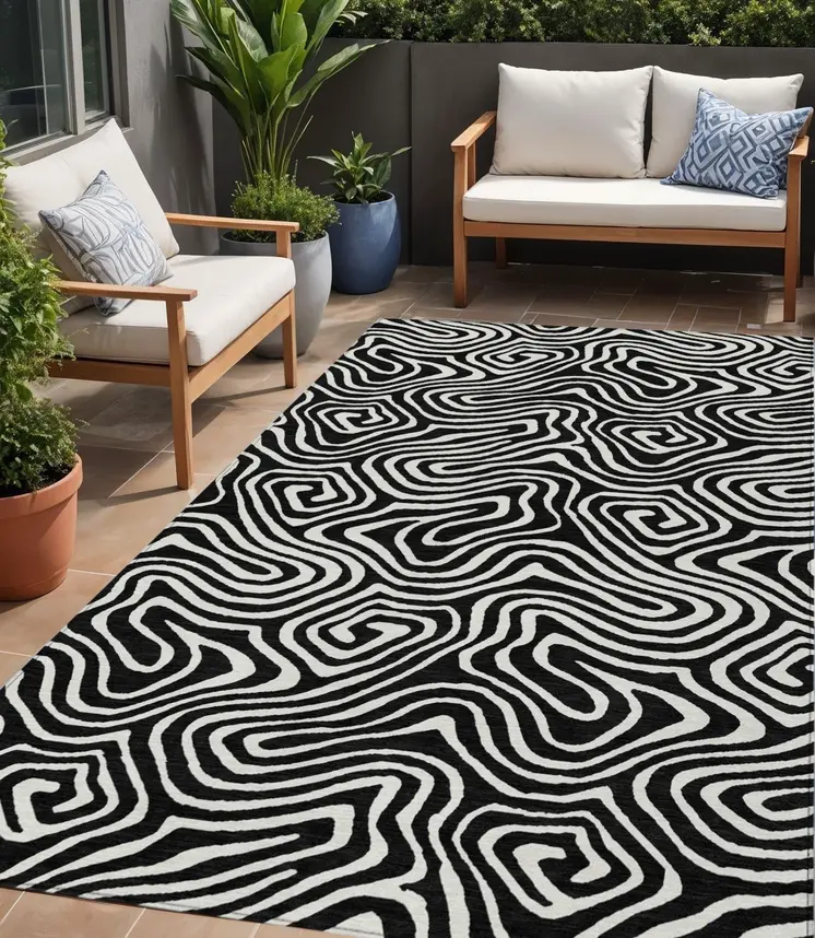 5' X 8' Black And Ivory Abstract Washable Indoor Outdoor Area Rug