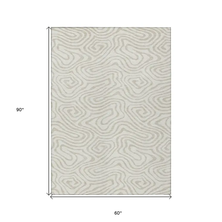5' X 8' Ivory And Beige Abstract Washable Indoor Outdoor Area Rug