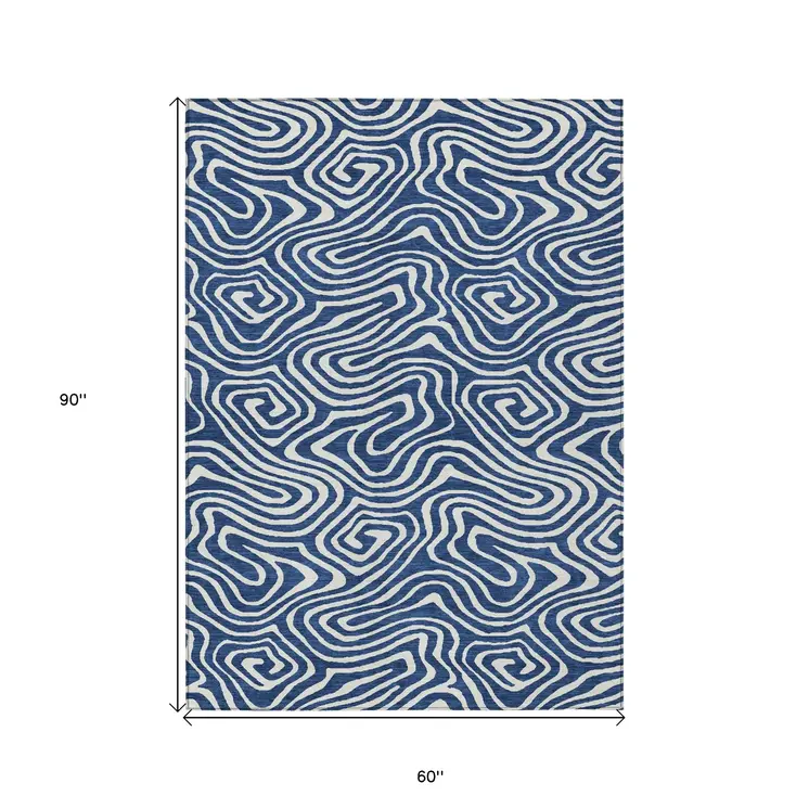 5' X 8' Navy Blue And Ivory Abstract Washable Indoor Outdoor Area Rug