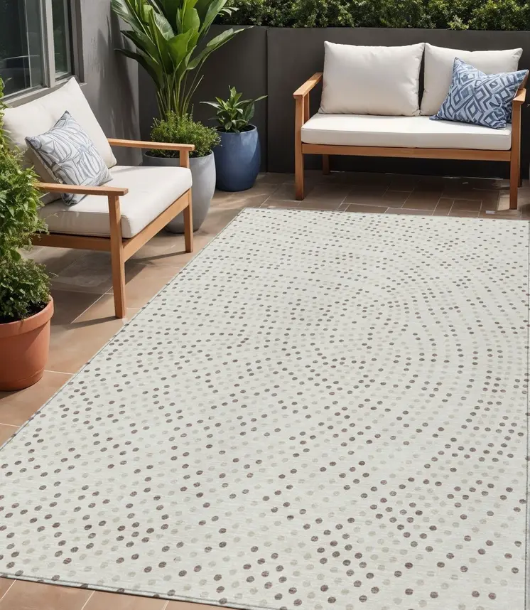 5' X 8' Ivory And Brown Polka Dot Washable Indoor Outdoor Area Rug