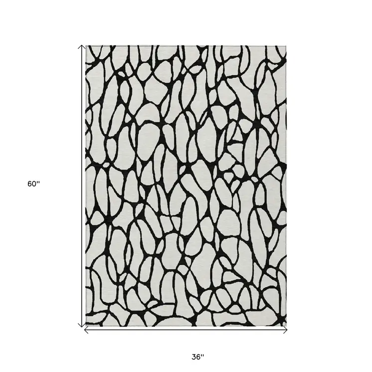 3' X 5' Ivory And Black Geometric Washable Indoor Outdoor Area Rug