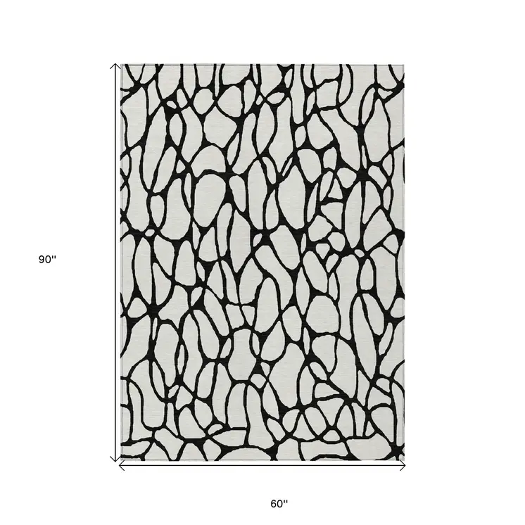 5' X 8' Ivory And Black Geometric Washable Indoor Outdoor Area Rug