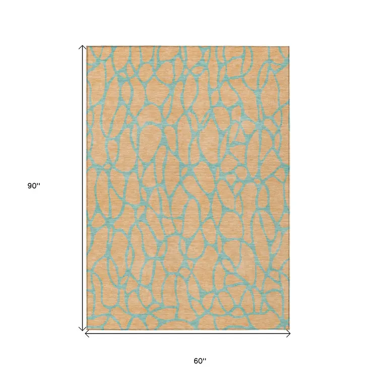 5' X 8' Mint Green And Peach Geometric Washable Indoor Outdoor Area Rug