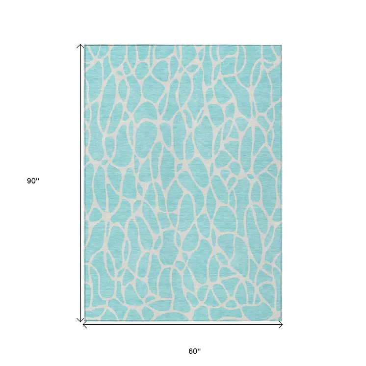 5' X 8' Aqua And Ivory Geometric Washable Indoor Outdoor Area Rug