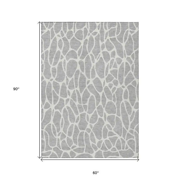 5' X 8' Silver And Ivory Geometric Washable Indoor Outdoor Area Rug