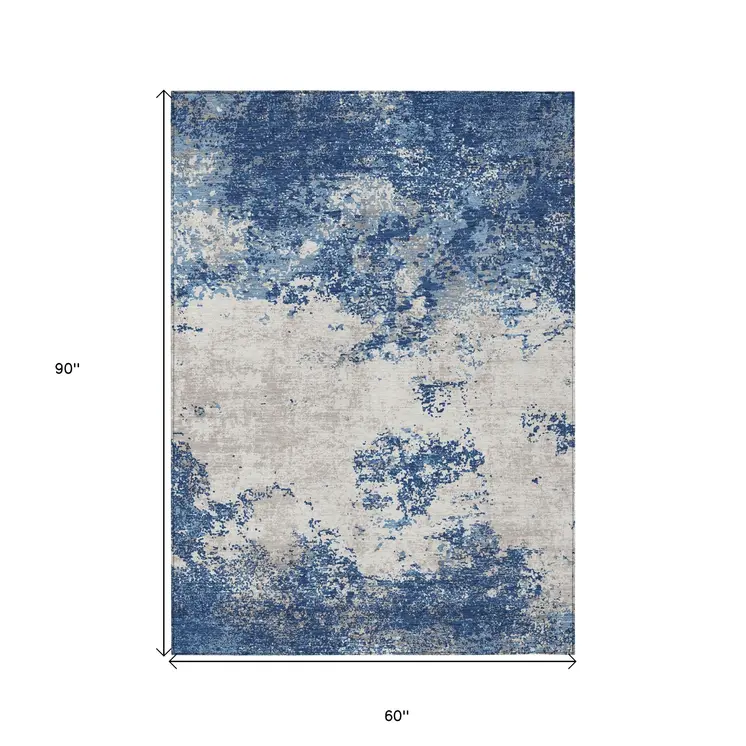 5' X 8' Navy Blue And Ivory Abstract Washable Indoor Outdoor Area Rug