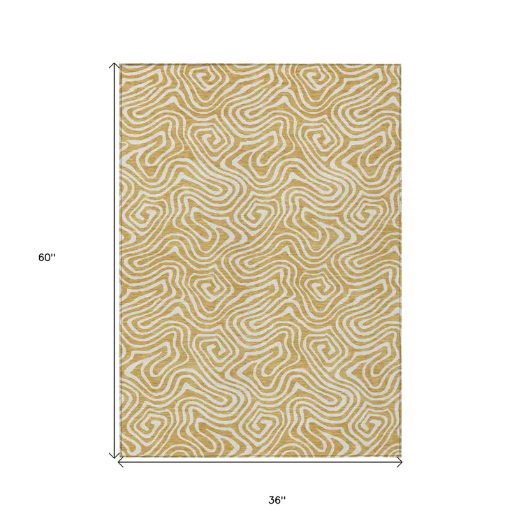 3' X 5' Gold And Ivory Abstract Washable Indoor Outdoor Area Rug