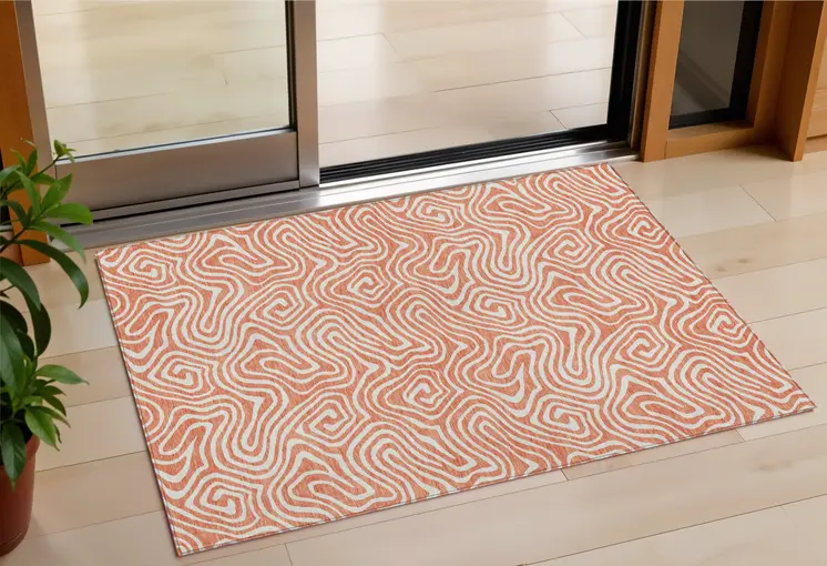 3' X 5' Salmon And Ivory Abstract Washable Indoor Outdoor Area Rug