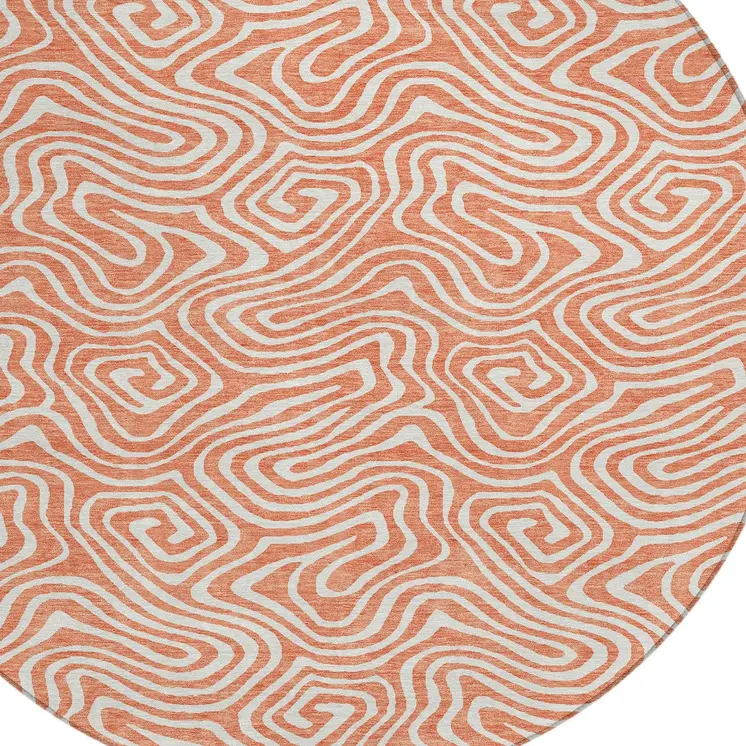 8' Salmon And Ivory Round Abstract Washable Indoor Outdoor Area Rug