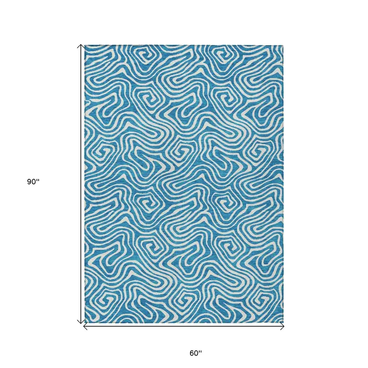 5' X 8' Teal Blue And Ivory Abstract Washable Indoor Outdoor Area Rug