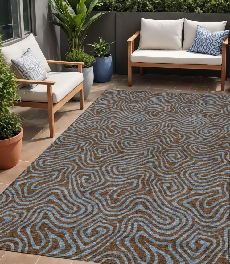 5' X 8' Brown And Light Blue Abstract Washable Indoor Outdoor Area Rug