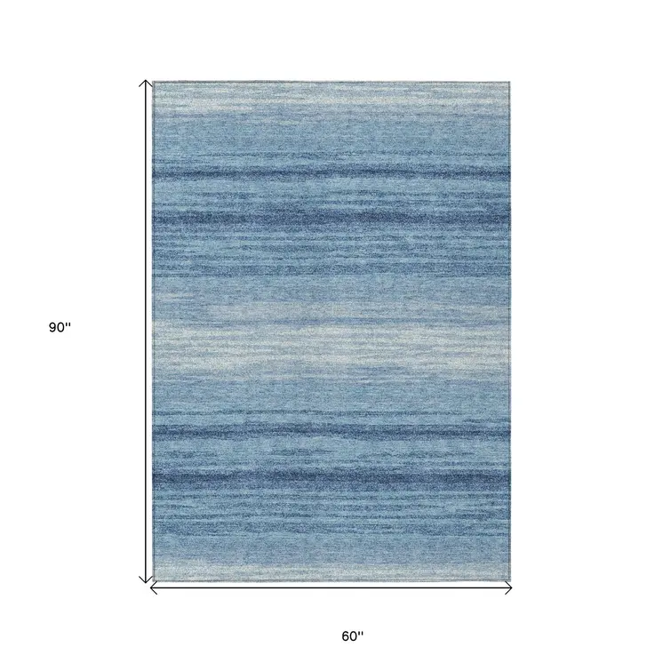 5' X 8' Blue And Ivory Abstract Washable Indoor Outdoor Area Rug