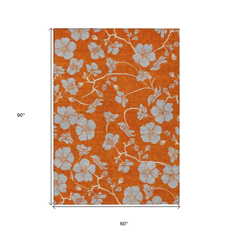 5' X 8' Orange And Gray Floral Washable Indoor Outdoor Area Rug