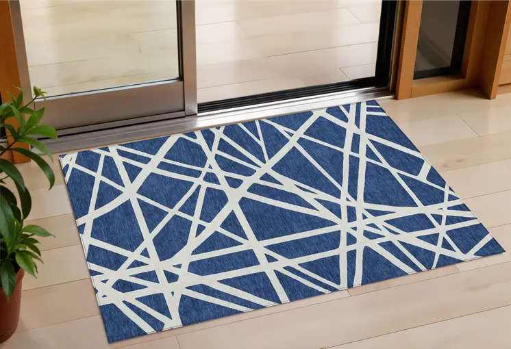 3' X 5' Navy Blue And Ivory Geometric Washable Indoor Outdoor Area Rug