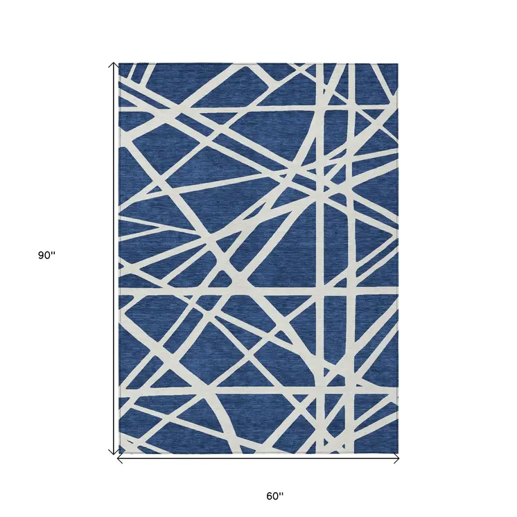 5' X 8' Navy Blue And Ivory Geometric Washable Indoor Outdoor Area Rug