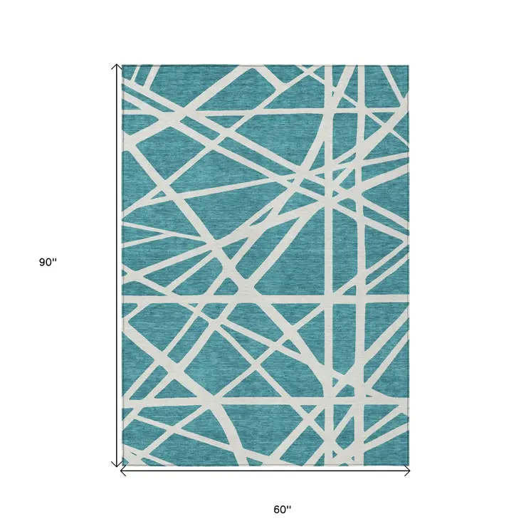 5' X 8' Teal Blue And Ivory Geometric Washable Indoor Outdoor Area Rug