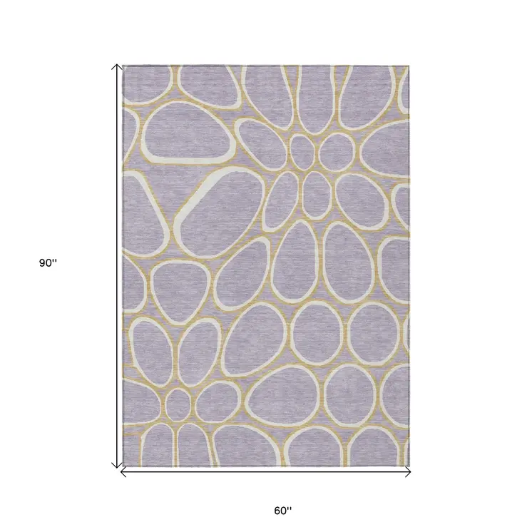 5' X 8' Lavender Ivory And Gold Abstract Washable Indoor Outdoor Area Rug