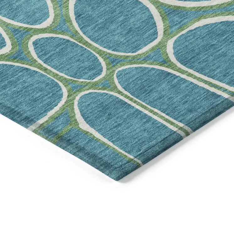 9' X 12' Teal Blue Ivory And Green Abstract Washable Indoor Outdoor Area Rug