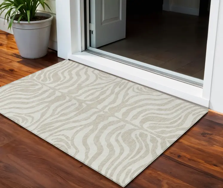 3' X 5' Beige And Tan Animal Print Washable Indoor Outdoor Area Rug