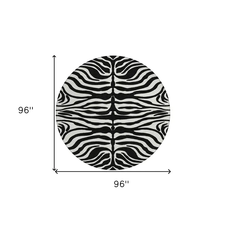 8' Black And Ivory Round Animal Print Washable Indoor Outdoor Area Rug