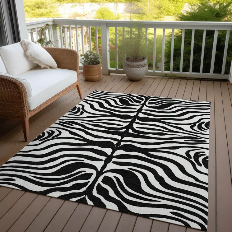 9' X 12' Black And Ivory Animal Print Washable Indoor Outdoor Area Rug