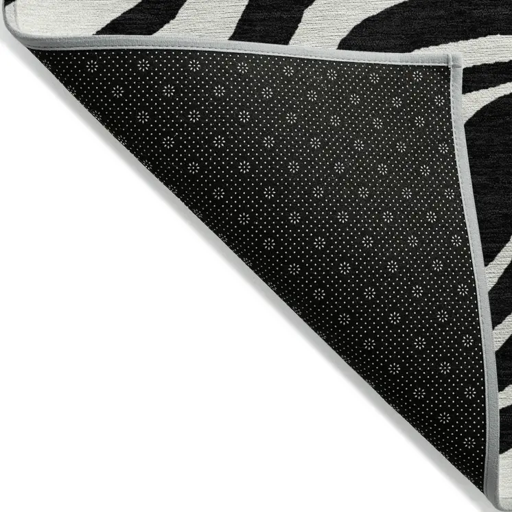 9' X 12' Black And Ivory Animal Print Washable Indoor Outdoor Area Rug