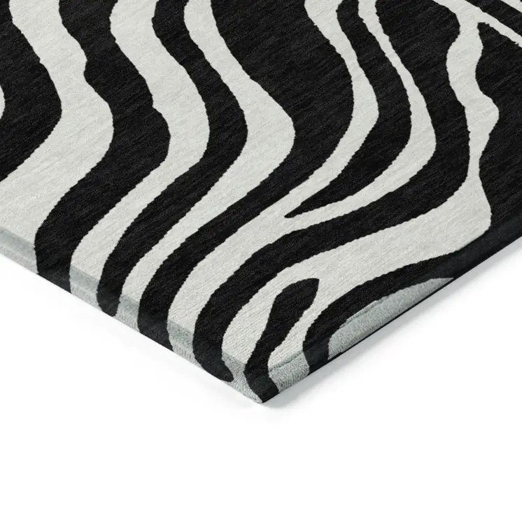 9' X 12' Black And Ivory Animal Print Washable Indoor Outdoor Area Rug