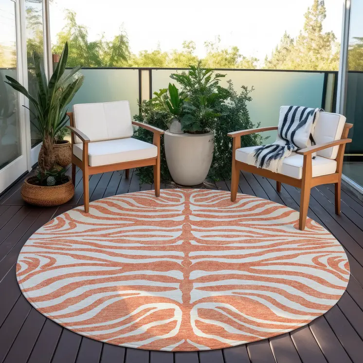 8' Coral And Ivory Round Animal Print Washable Indoor Outdoor Area Rug