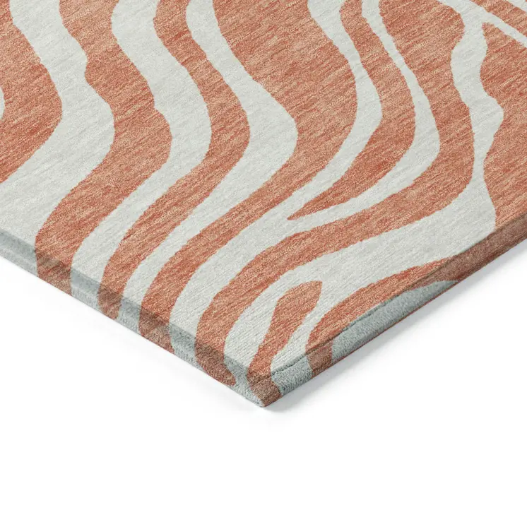 8' Coral And Ivory Round Animal Print Washable Indoor Outdoor Area Rug