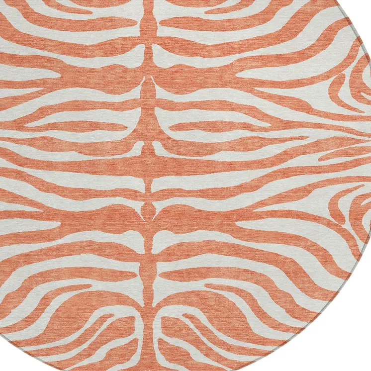 8' Coral And Ivory Round Animal Print Washable Indoor Outdoor Area Rug