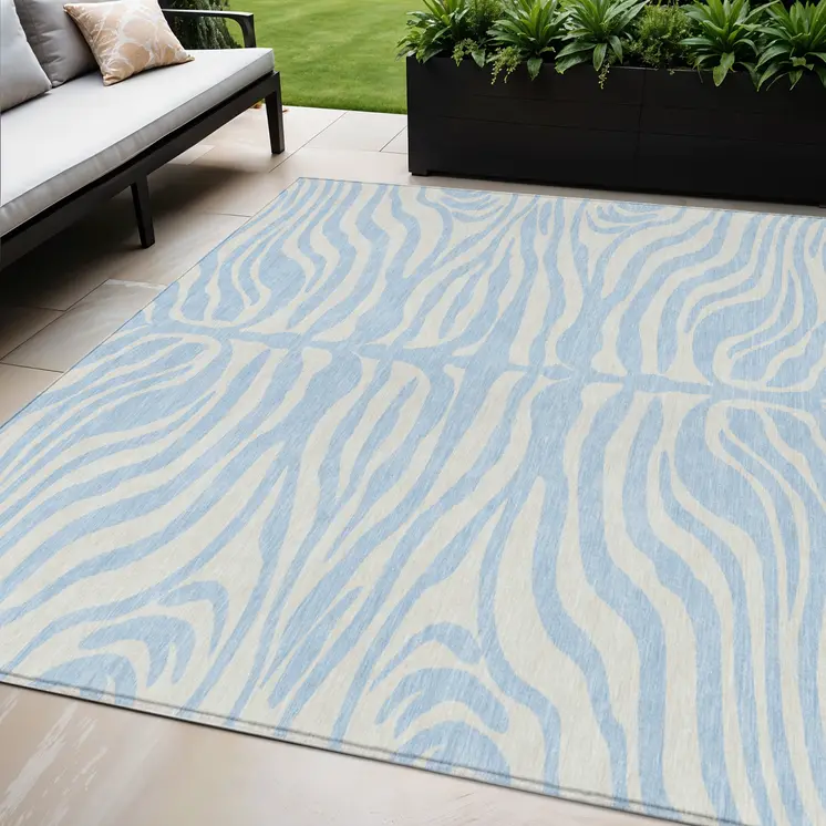 5' X 8' Sky Blue And Ivory Animal Print Washable Indoor Outdoor Area Rug