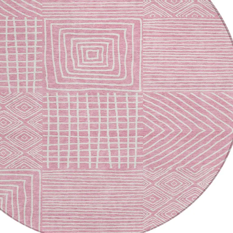 8' Pink And Ivory Round Geometric Washable Indoor Outdoor Area Rug