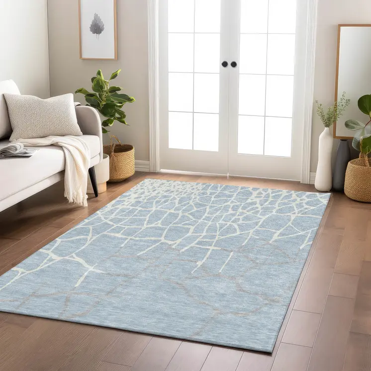 5' X 8' Sky Blue And Ivory Abstract Washable Indoor Outdoor Area Rug