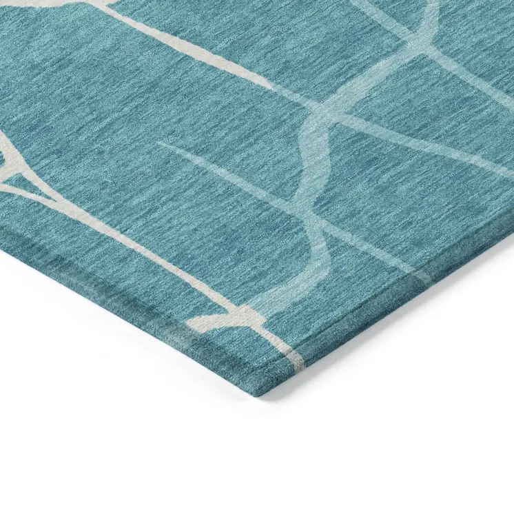 8' X 10' Teal Blue And Ivory Abstract Washable Indoor Outdoor Area Rug