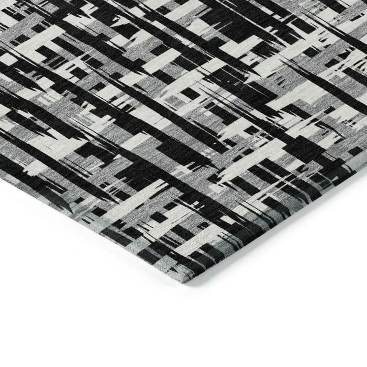 5' X 8' Black Gray And Ivory Abstract Washable Indoor Outdoor Area Rug