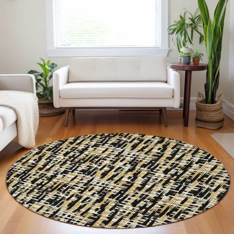 8' Black Gold And Ivory Round Abstract Washable Indoor Outdoor Area Rug