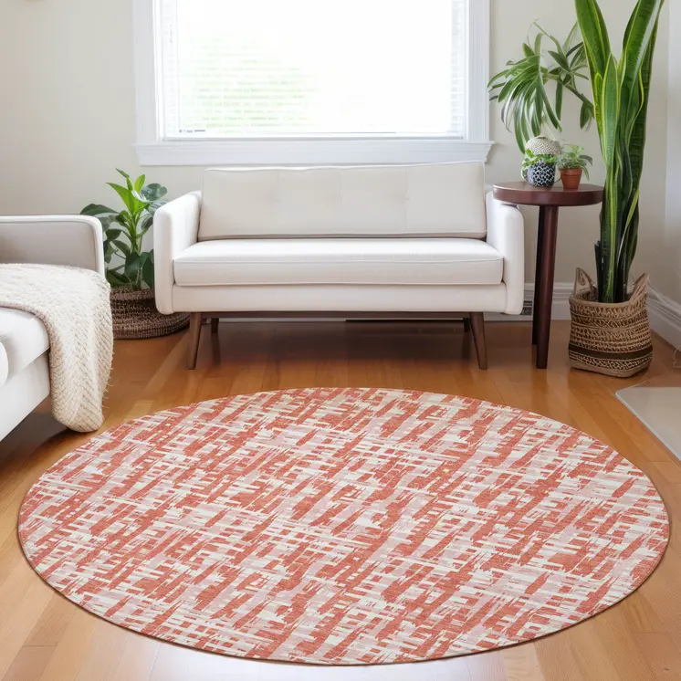 8' Coral Pink And Ivory Round Abstract Washable Indoor Outdoor Area Rug